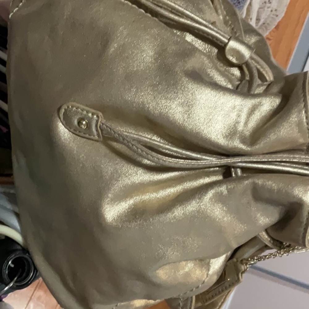 Mettalic Gold Cole Hann drawstring hobo bag